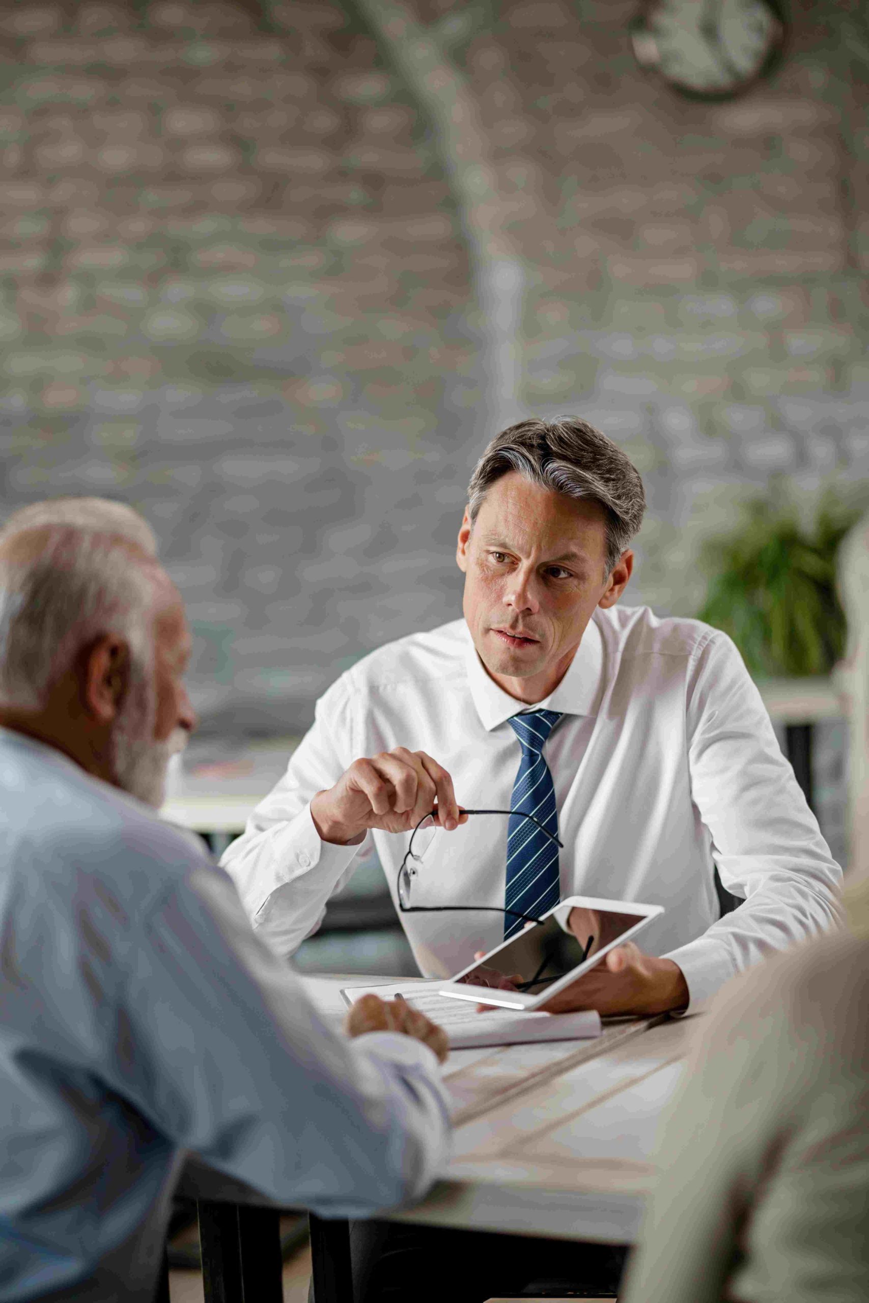 a man offering a business loan liverpool service