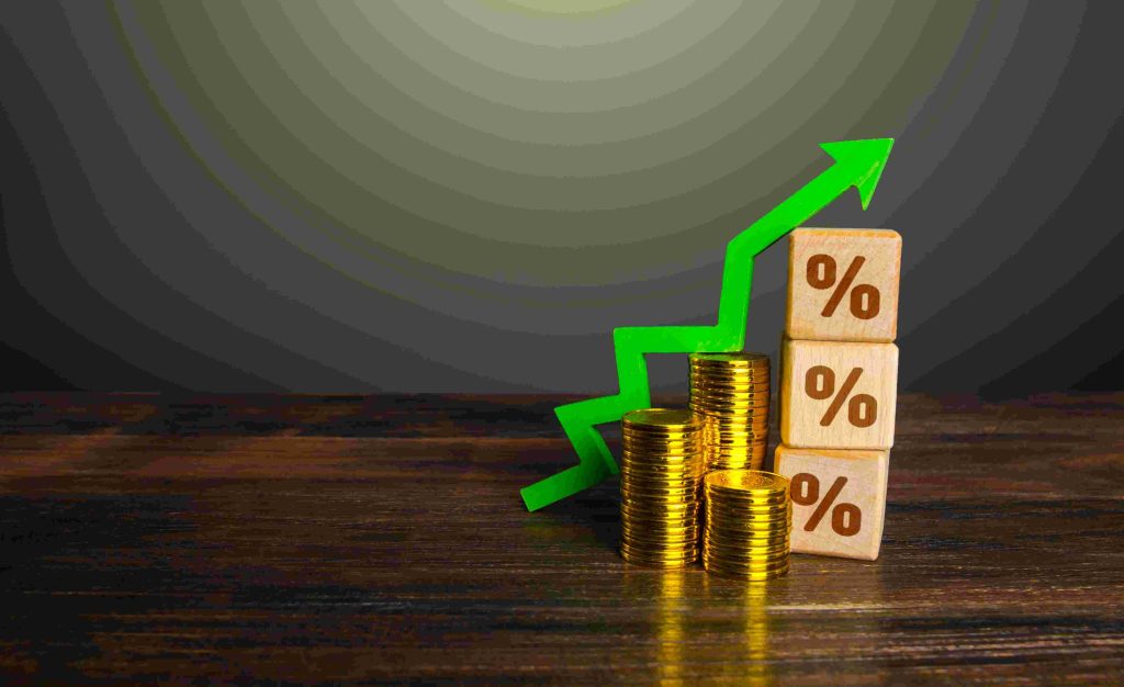 short-term business loan rates going up with a green arrow